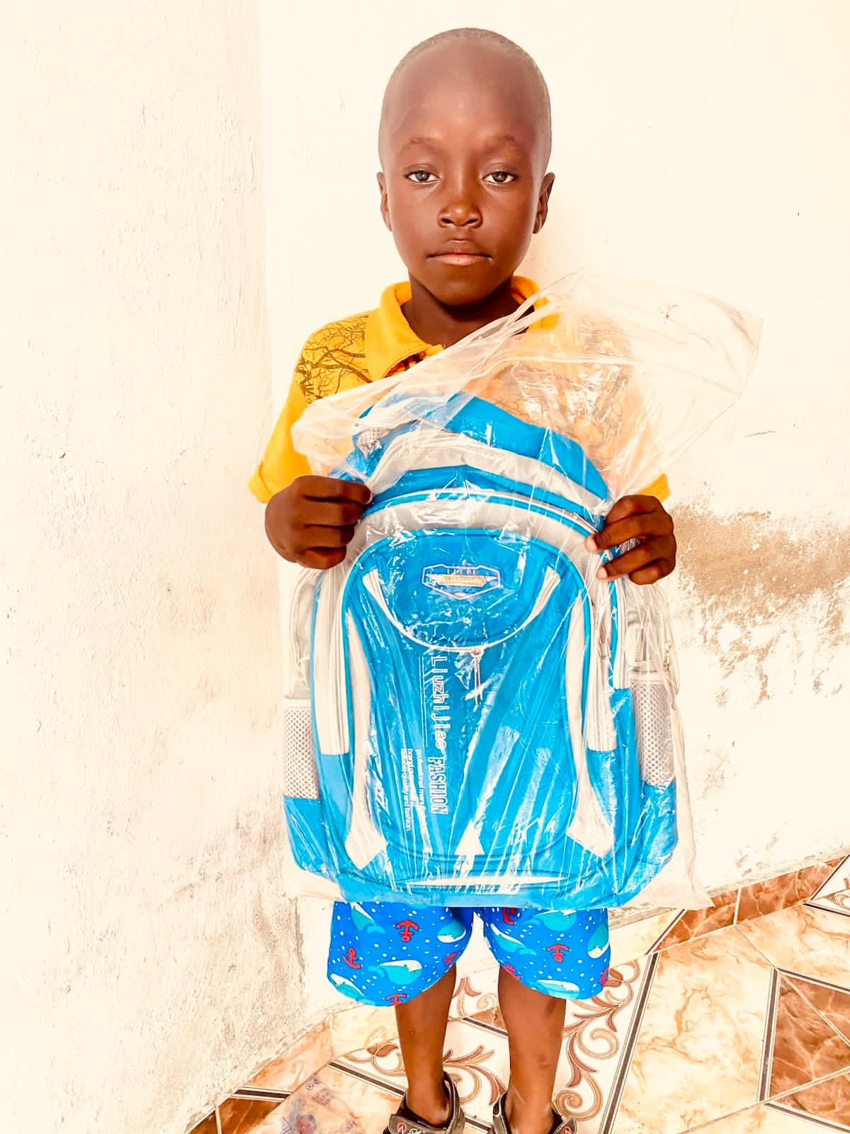 Student with a new blue backpack