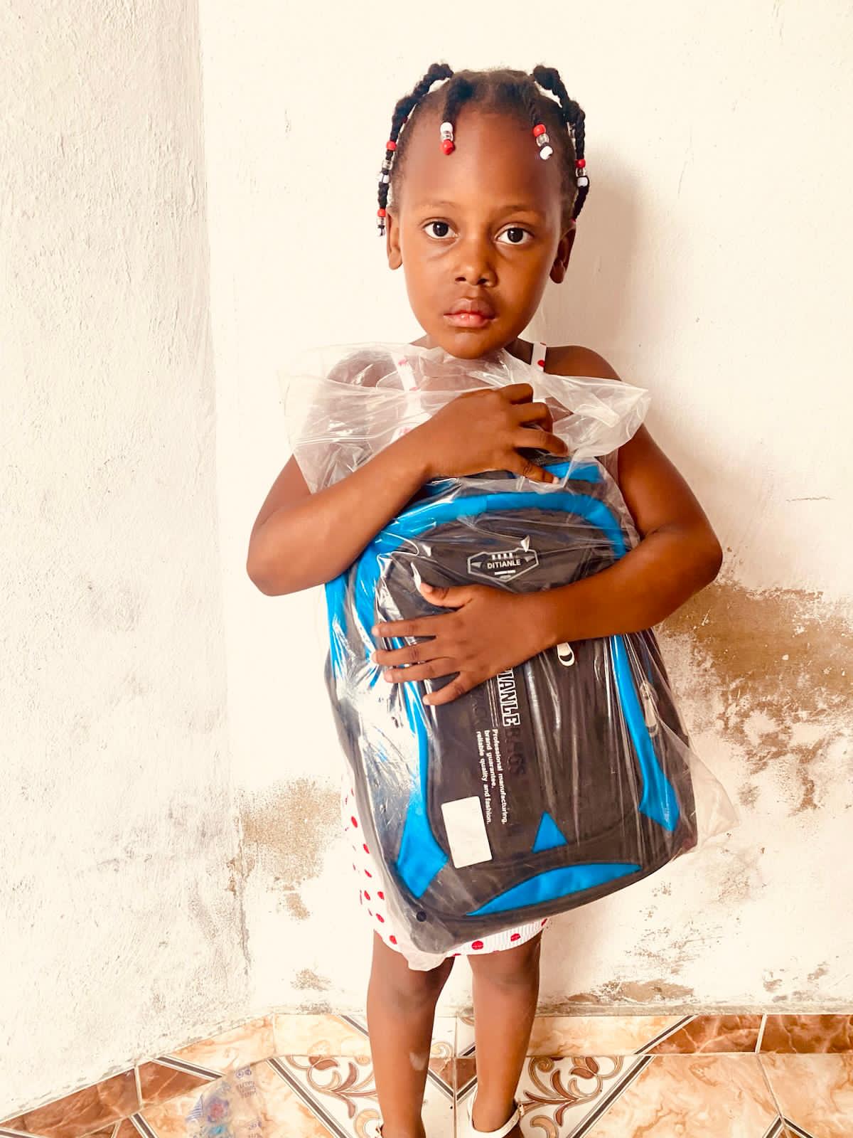 Proud moment — new school bag still wrapped